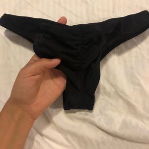 Black Victoria secret bikini bottoms very cheeky